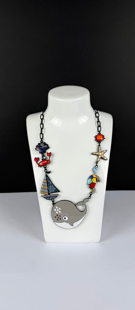 Collar ballena gris