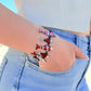 Rotes Fischarmband