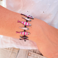 Pulsera peces rayados rosas