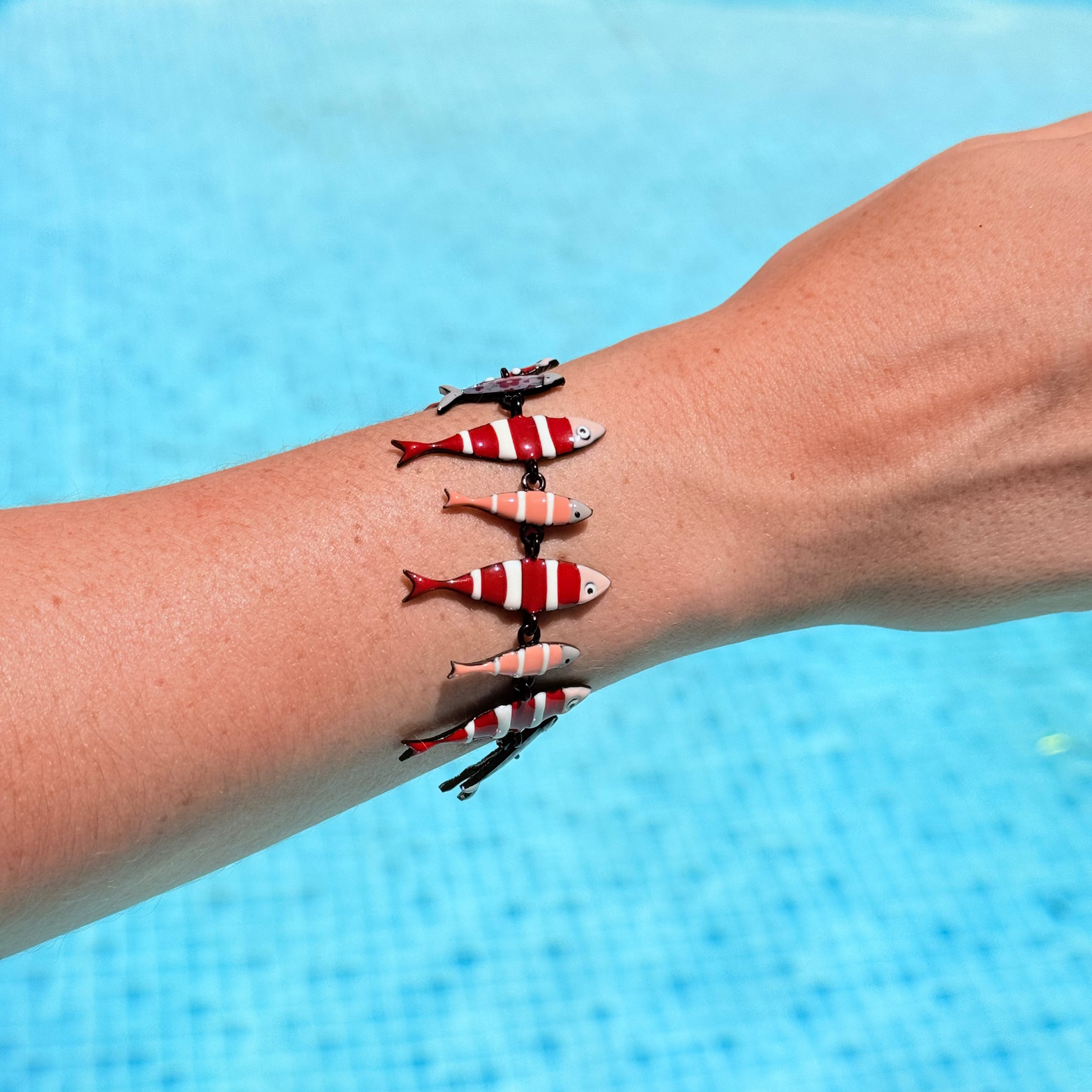 Pulsera peces rayados rojos